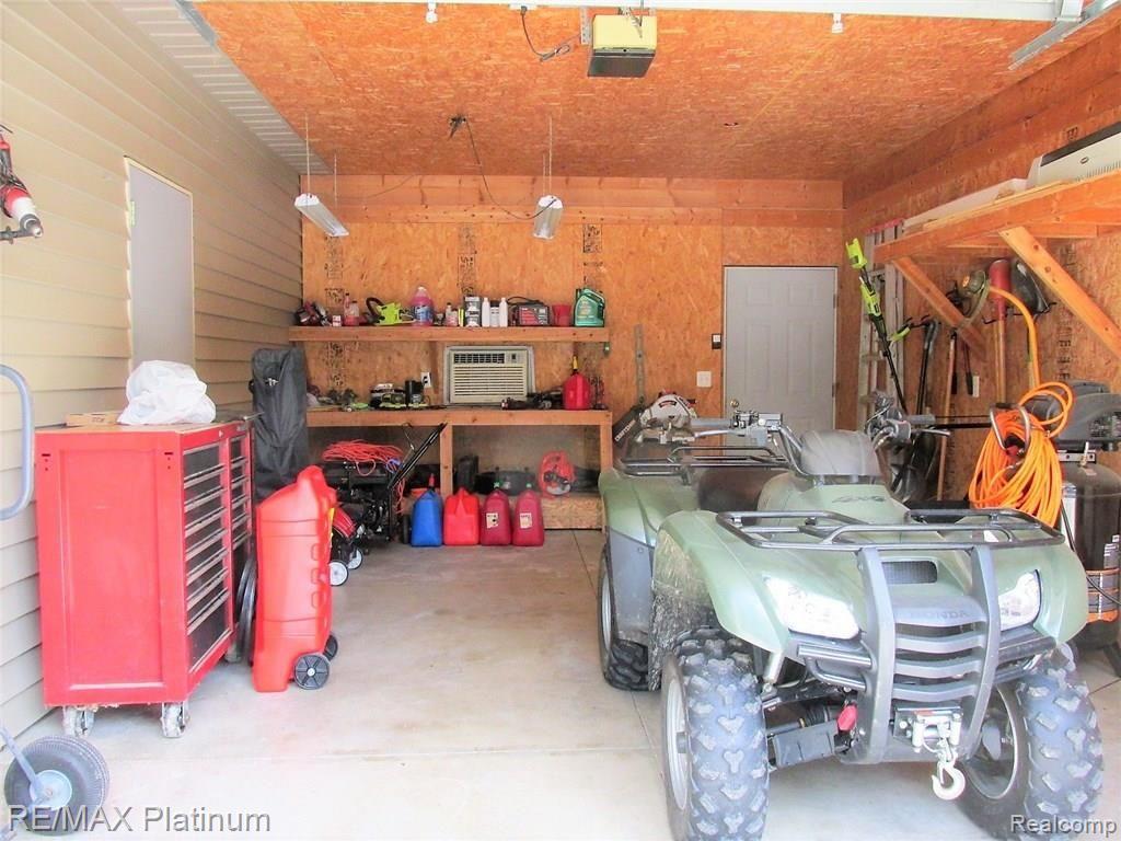 3215 Rafferty Drive Howell, MI 48843 - Photo 6 of 53 ATTACHED 3RD CAR GARAGE IS 15 X 24'