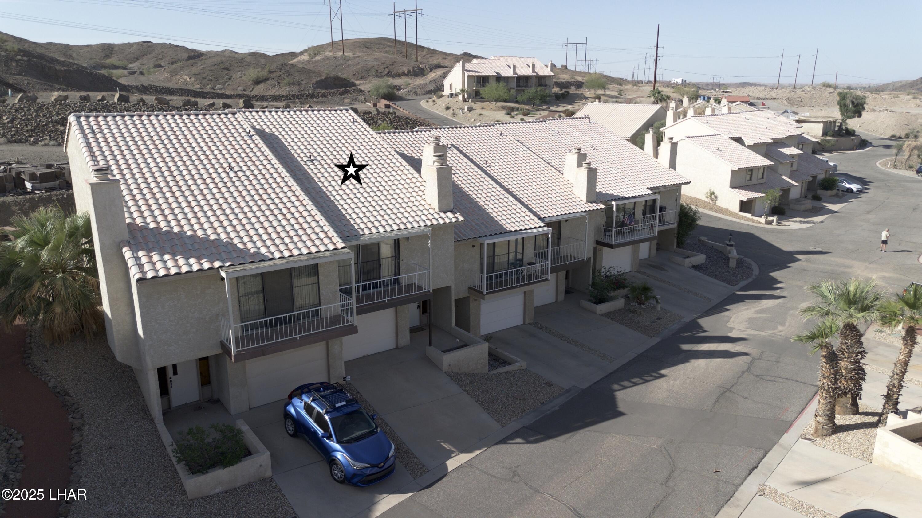 8625 Riverside Drive, Unit 38 Parker, AZ 85344 - Photo 2 of 48 a view of a terrace with a couch