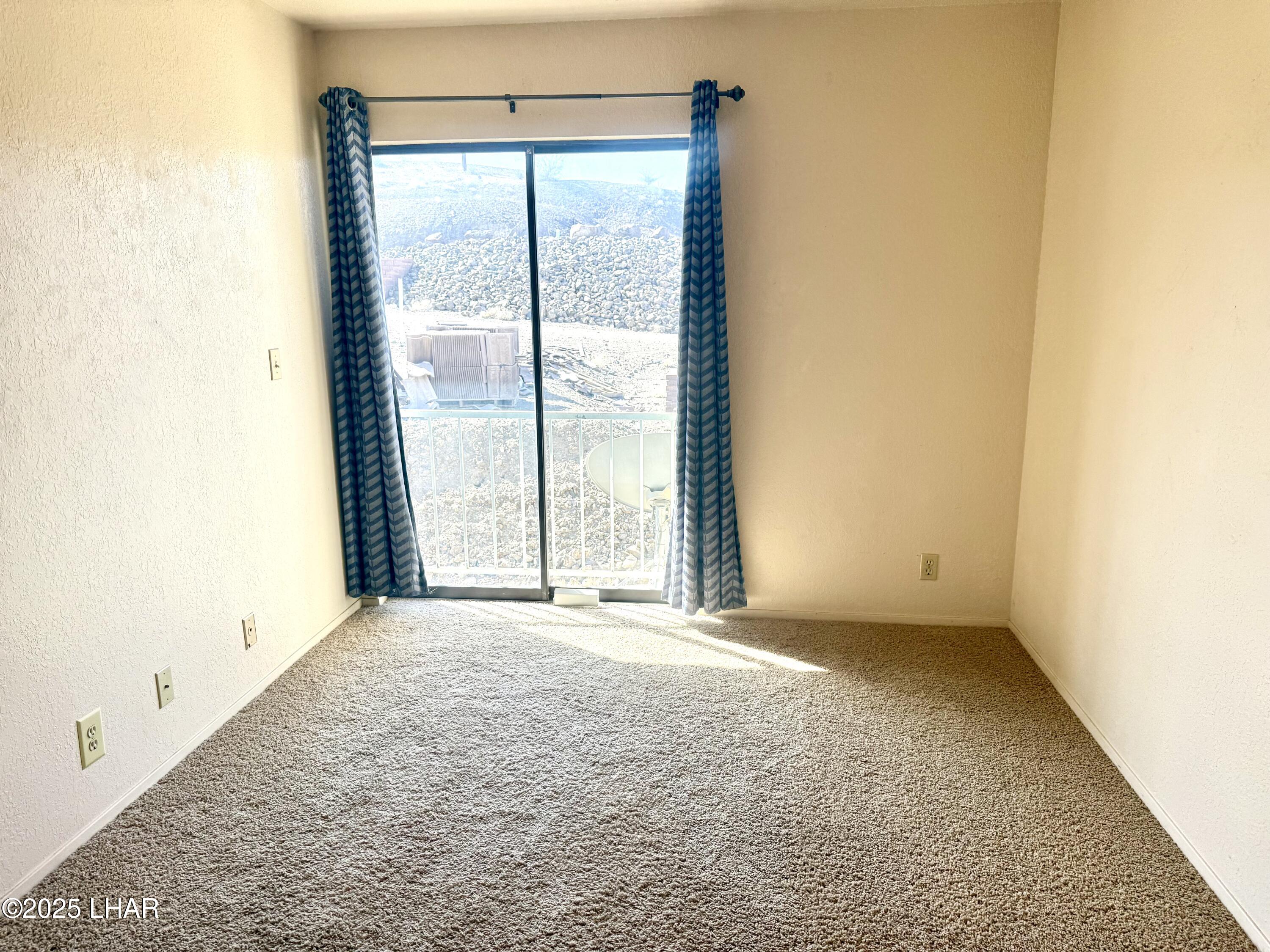 8625 Riverside Drive, Unit 38 Parker, AZ 85344 - Photo 28 of 48 a view of an empty room with a window