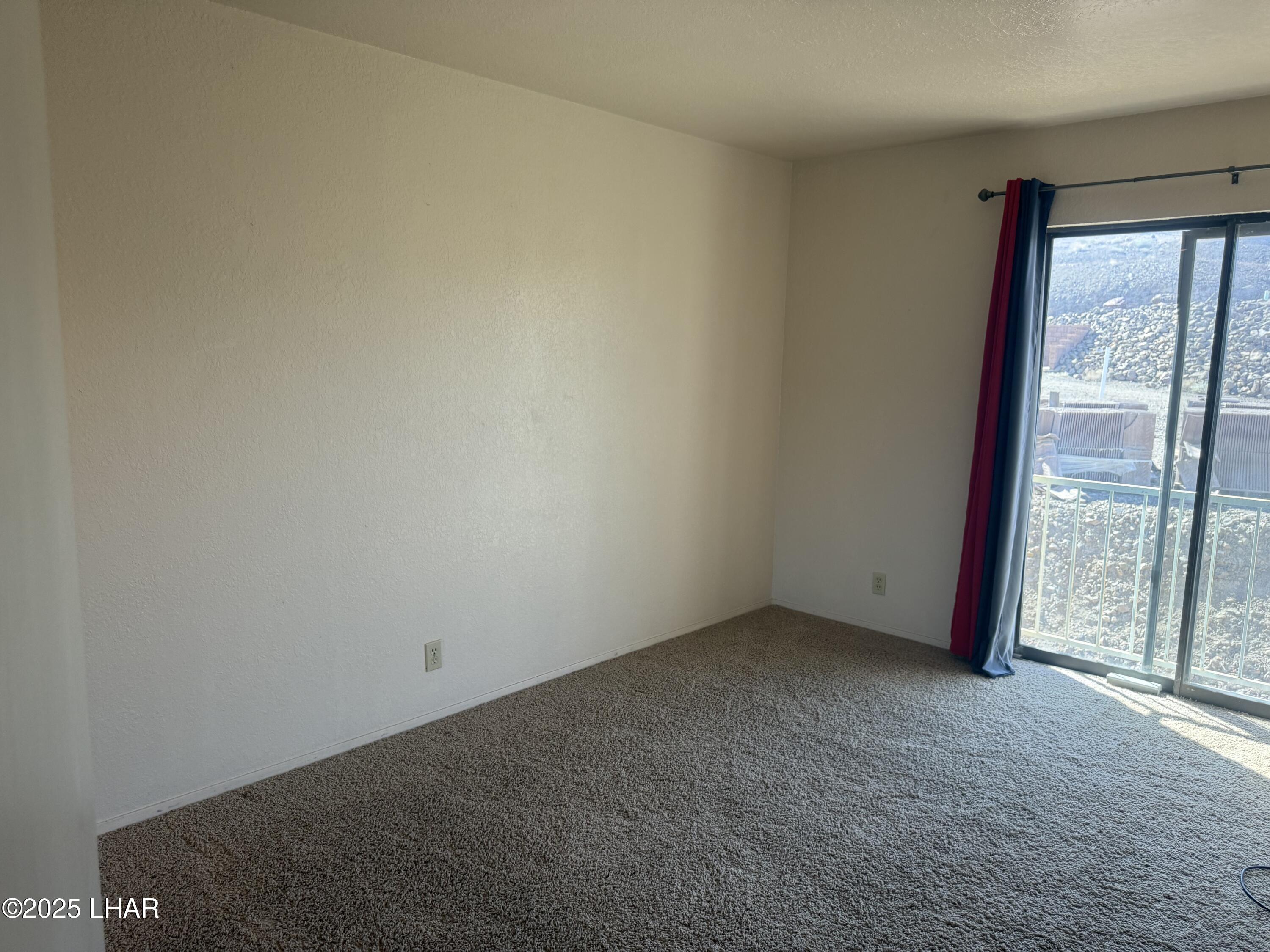 8625 Riverside Drive, Unit 38 Parker, AZ 85344 - Photo 31 of 48 an empty room with a window