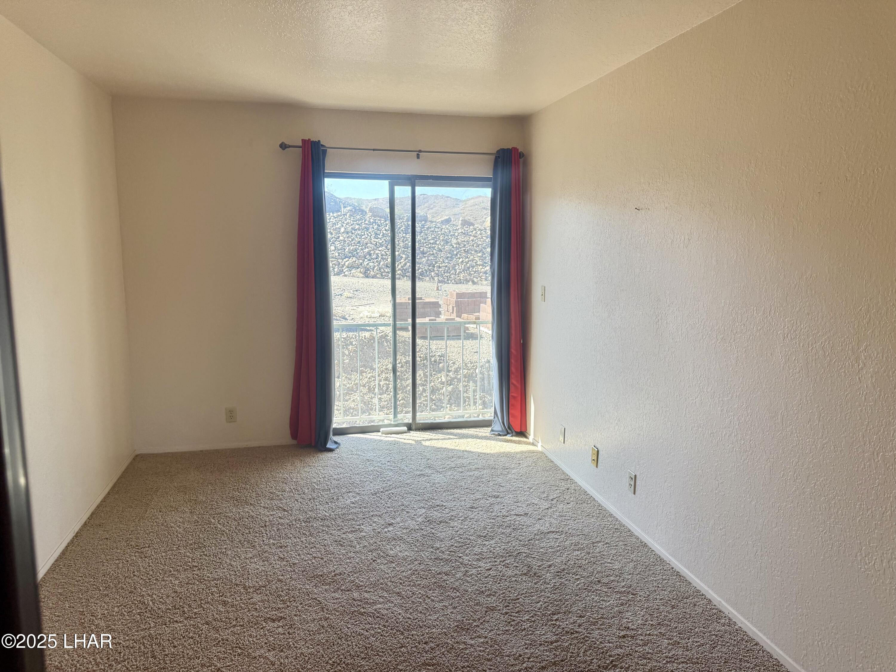 8625 Riverside Drive, Unit 38 Parker, AZ 85344 - Photo 33 of 48 a view of an empty room with a window