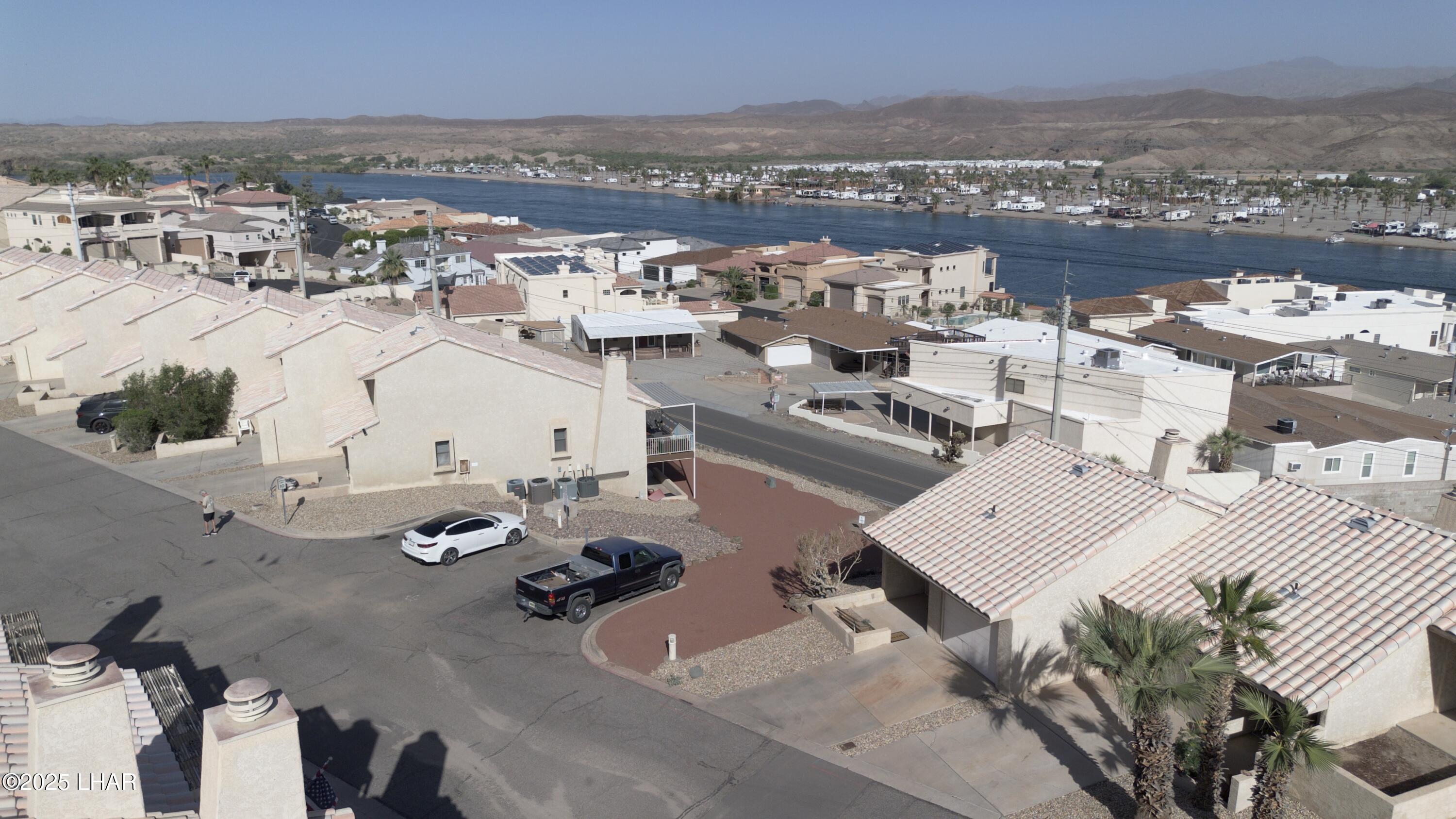 8625 Riverside Drive, Unit 38 Parker, AZ 85344 - Photo 43 of 48 an aerial view of a house with outdoor space
