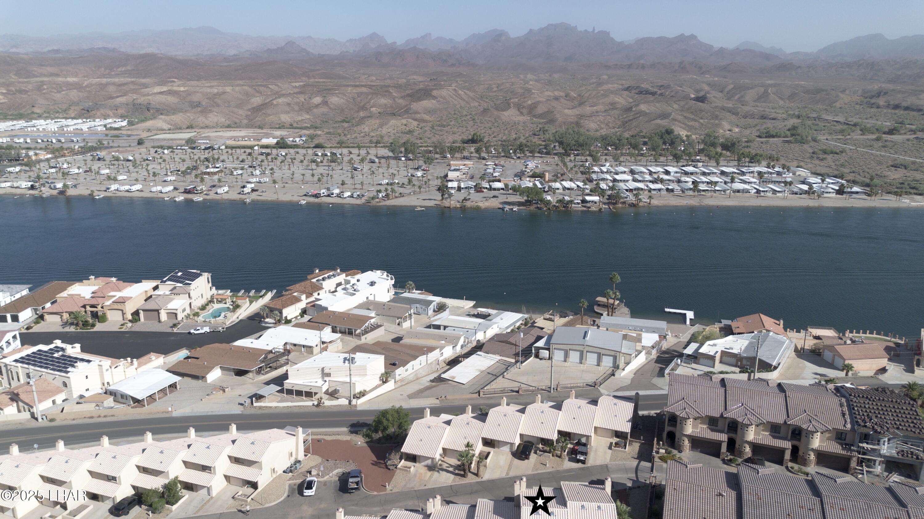 8625 Riverside Drive, Unit 38 Parker, AZ 85344 - Photo 46 of 48 a view of a lake and a mountain view