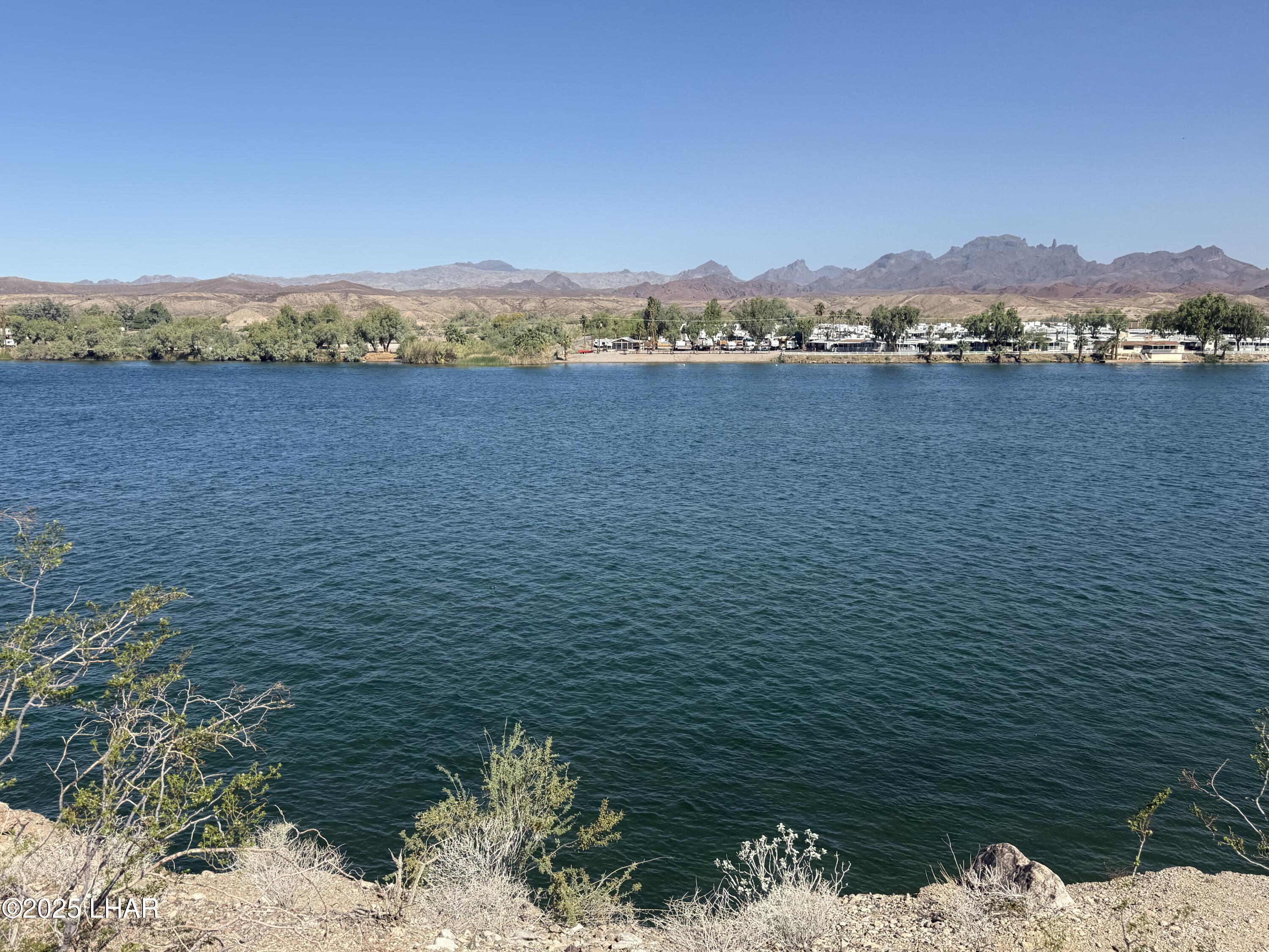 8625 Riverside Drive, Unit 38 Parker, AZ 85344 - Photo 48 of 48 a view of lake with mountain