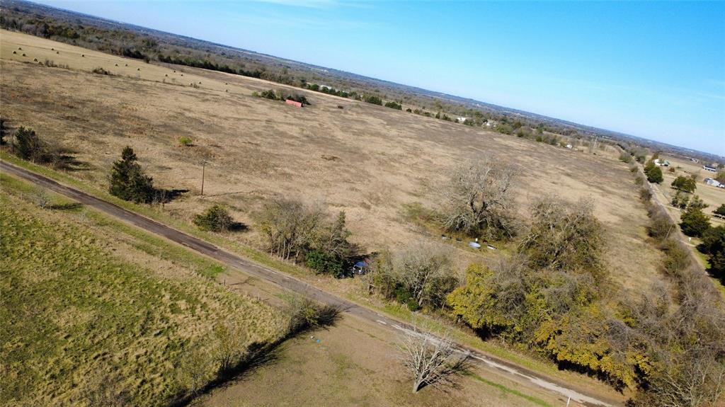 0 Lcr 454 Groesbeck, TX 76642 - Photo 19 of 26 a view of a dry yard with wooden fence