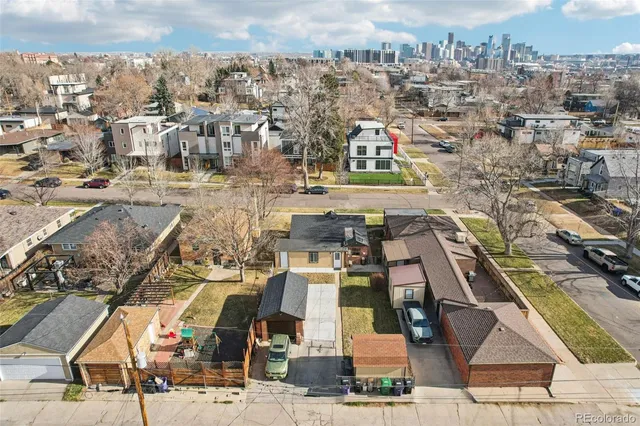 a picture of a wall with a white wall and a white refrigerator