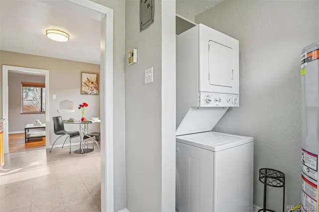 a hallway with a view of living room