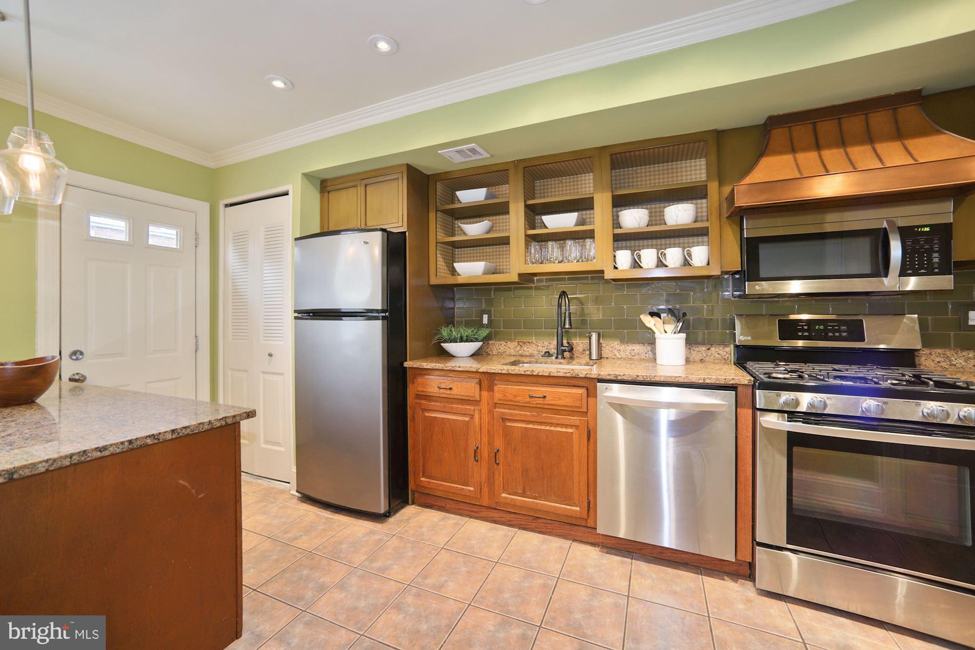 1724 E Street Northeast Washington, DC 20002 - Photo 12 of 24 Kitchen leads to patio