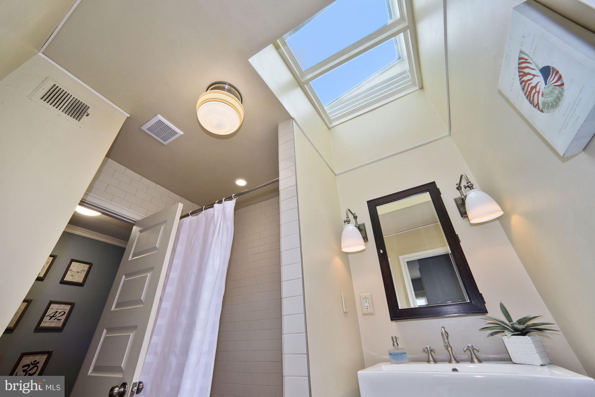 1724 E Street Northeast Washington, DC 20002 - Photo 17 of 24 Skylight in upper level bath