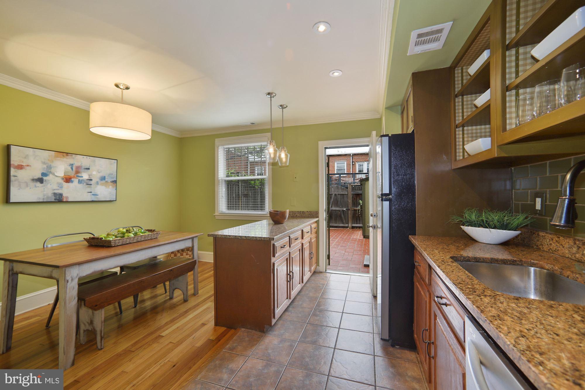 1724 E Street Northeast Washington, DC 20002 - Photo 10 of 24 Kitchen with island and dining area
