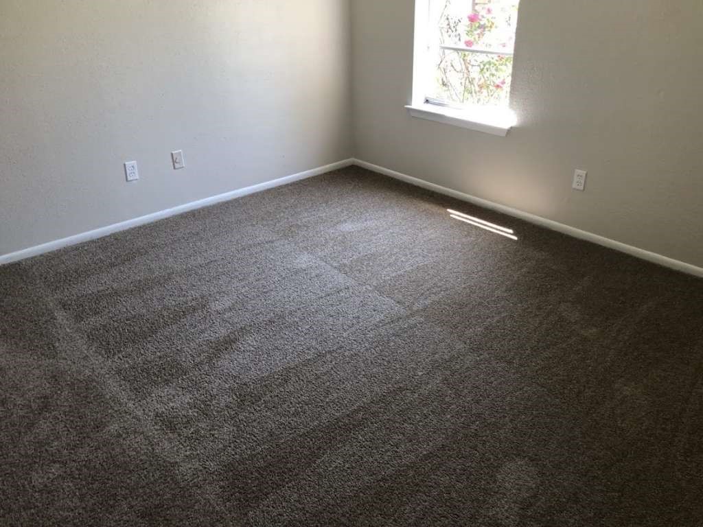 811 Buchta Road, Unit C Angleton, TX 77515 - Photo 6 of 10 an empty room with a window