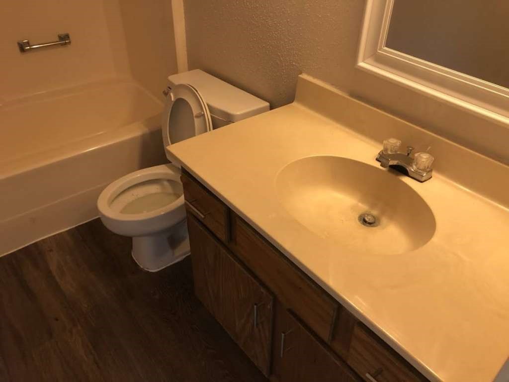 811 Buchta Road, Unit C Angleton, TX 77515 - Photo 9 of 10 a bathroom with a sink and toilet