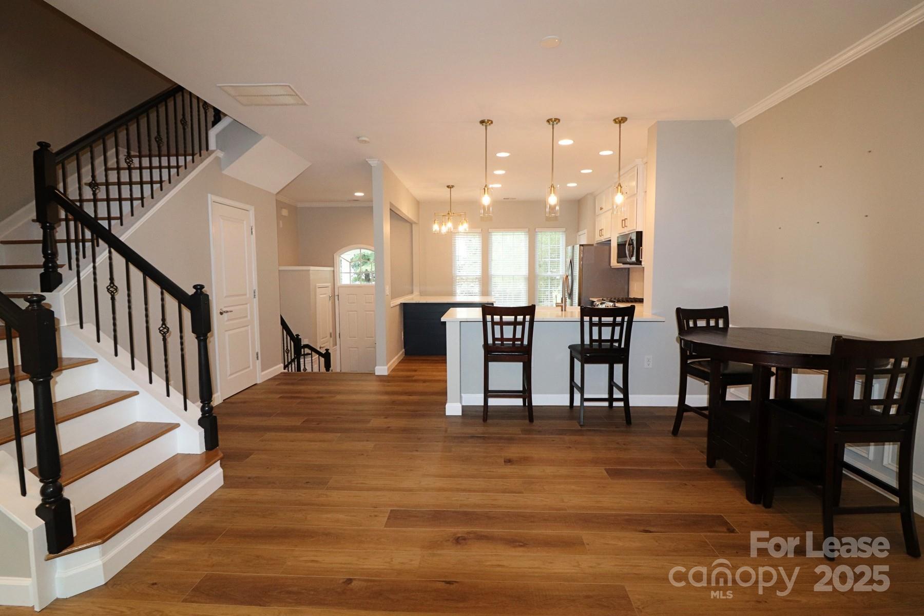 564 6th Baxter Crossing Fort Mill, SC 29708 - Photo 15 of 31 a view of kitchen with dining room and hall
