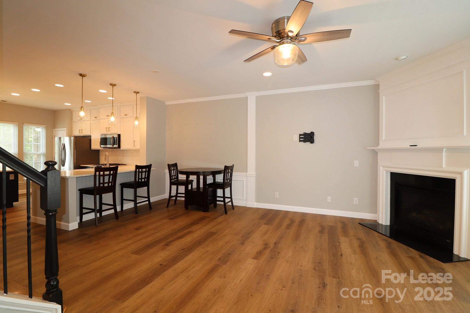 564 6th Baxter Crossing Fort Mill, SC 29708 - Photo 16 of 31 a open kitchen with a table and chairs
