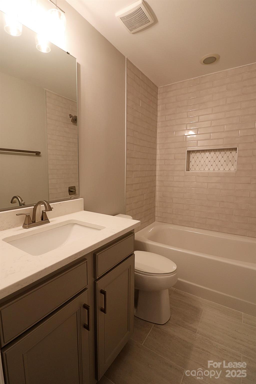 564 6th Baxter Crossing Fort Mill, SC 29708 - Photo 25 of 31 a bathroom with a sink a toilet and shower