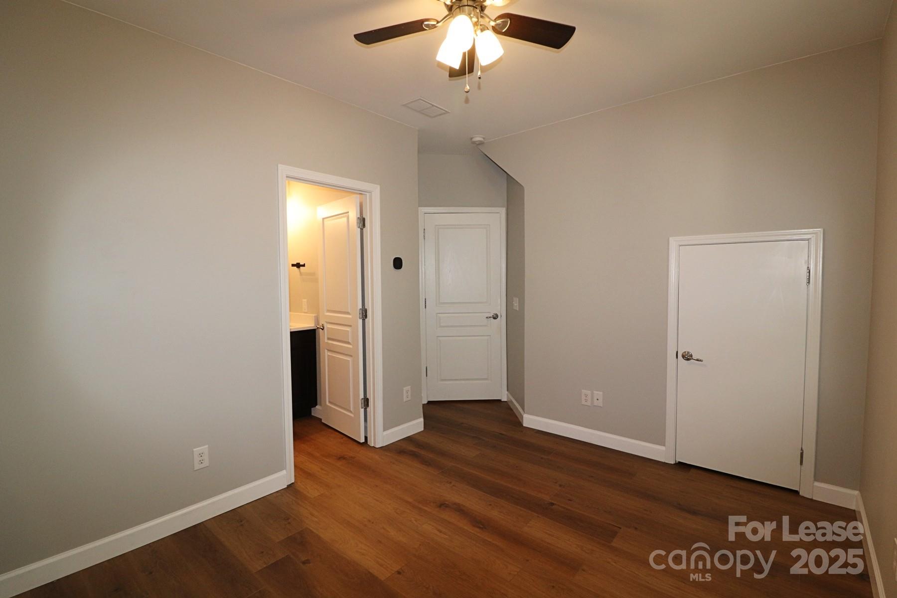 564 6th Baxter Crossing Fort Mill, SC 29708 - Photo 28 of 31 wooden floor in an empty room with a window