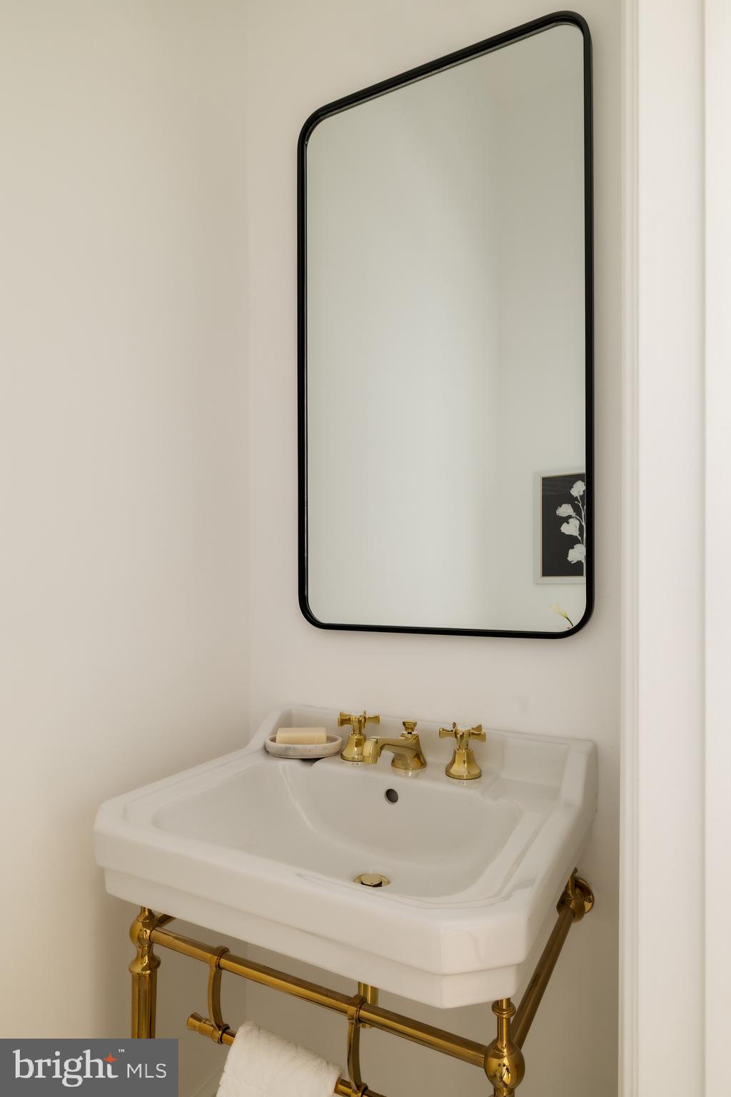 304 N Street Northwest, Unit 1 Washington, DC 20001 - Photo 22 of 47 a bathroom with a sink and mirror