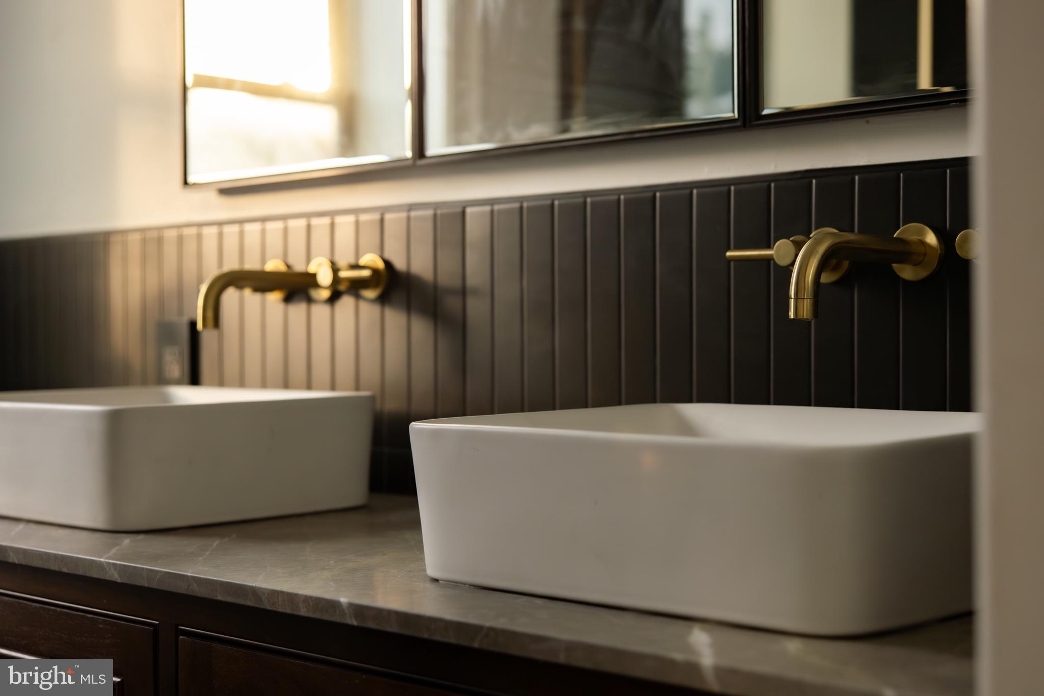 304 N Street Northwest, Unit 1 Washington, DC 20001 - Photo 27 of 47 a view of a bathtub in a cabinet