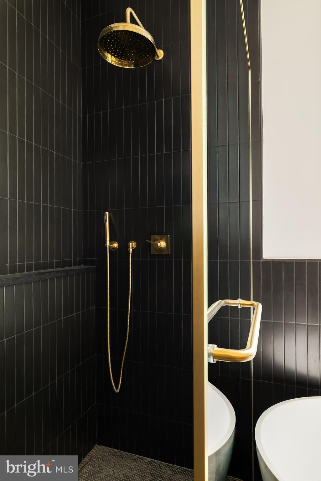 304 N Street Northwest, Unit 1 Washington, DC 20001 - Photo 33 of 47 a bathroom with a toilet and shower