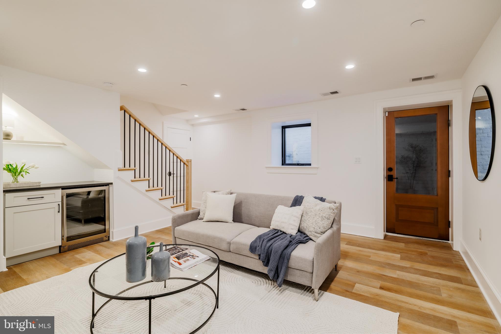 304 N Street Northwest, Unit 1 Washington, DC 20001 - Photo 42 of 47 a living room with furniture or couch and a table