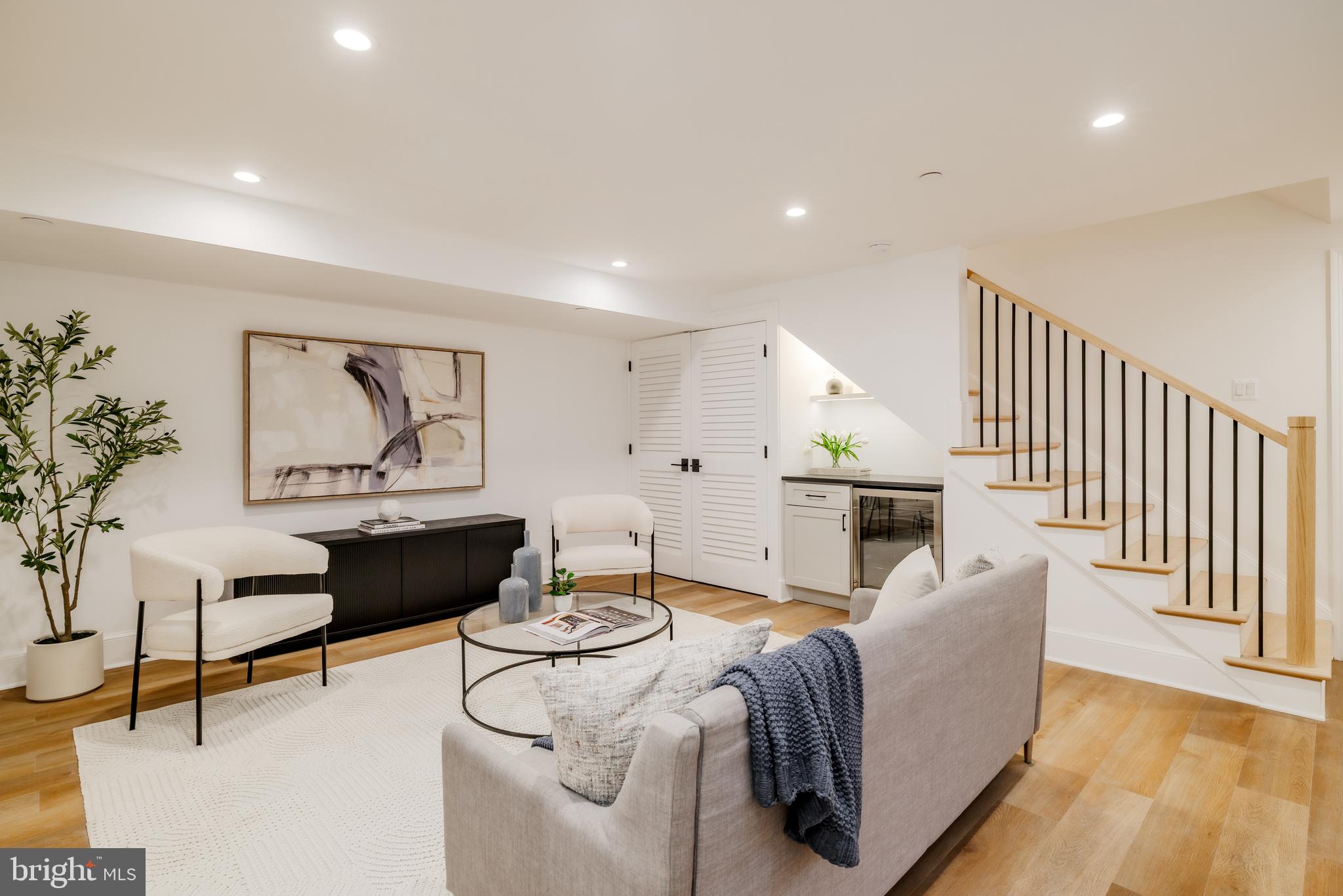 304 N Street Northwest, Unit 1 Washington, DC 20001 - Photo 44 of 47 a living room with furniture and wooden floor