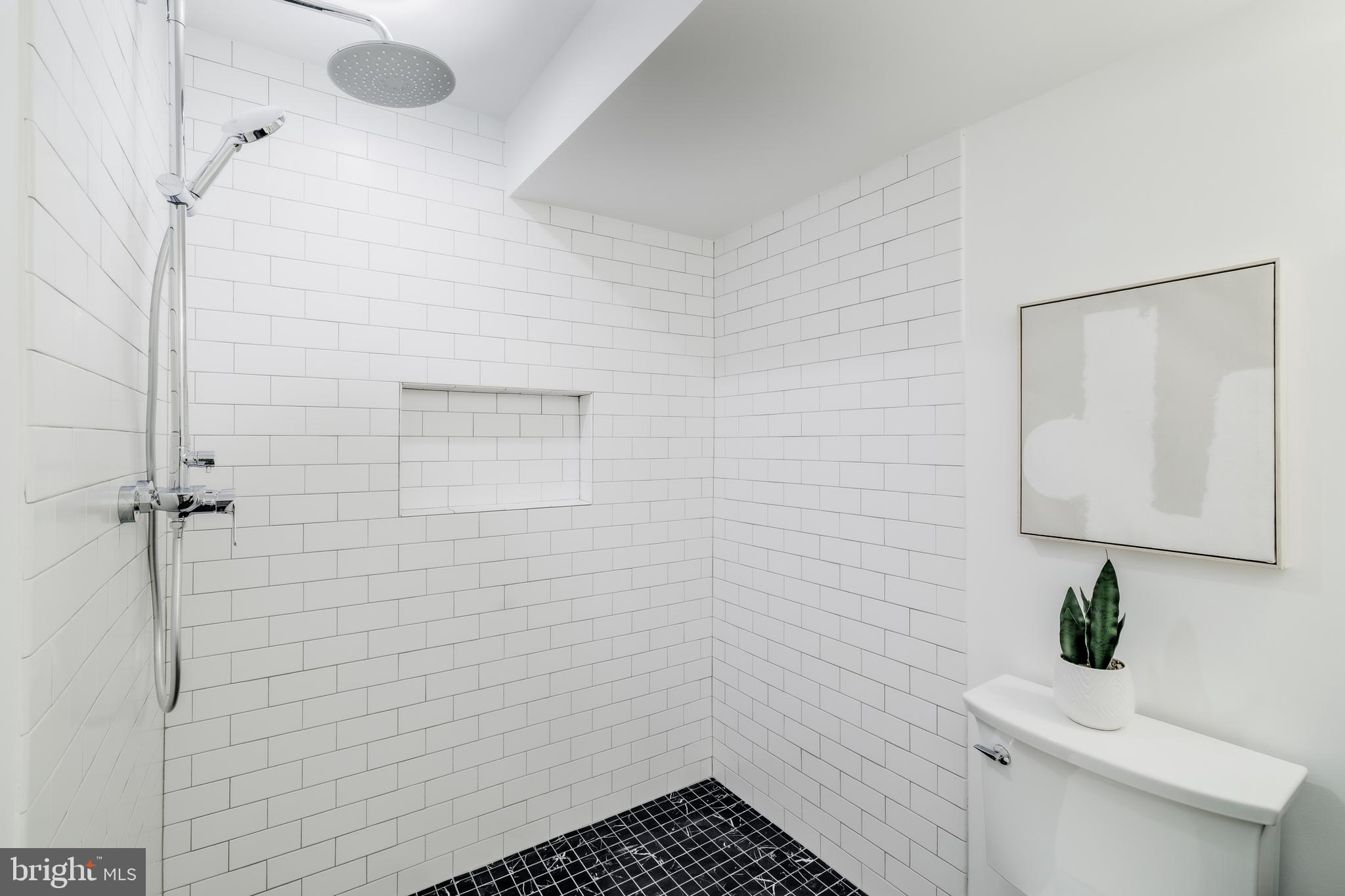 304 N Street Northwest, Unit 1 Washington, DC 20001 - Photo 46 of 47 a bathroom with a toilet and a sink