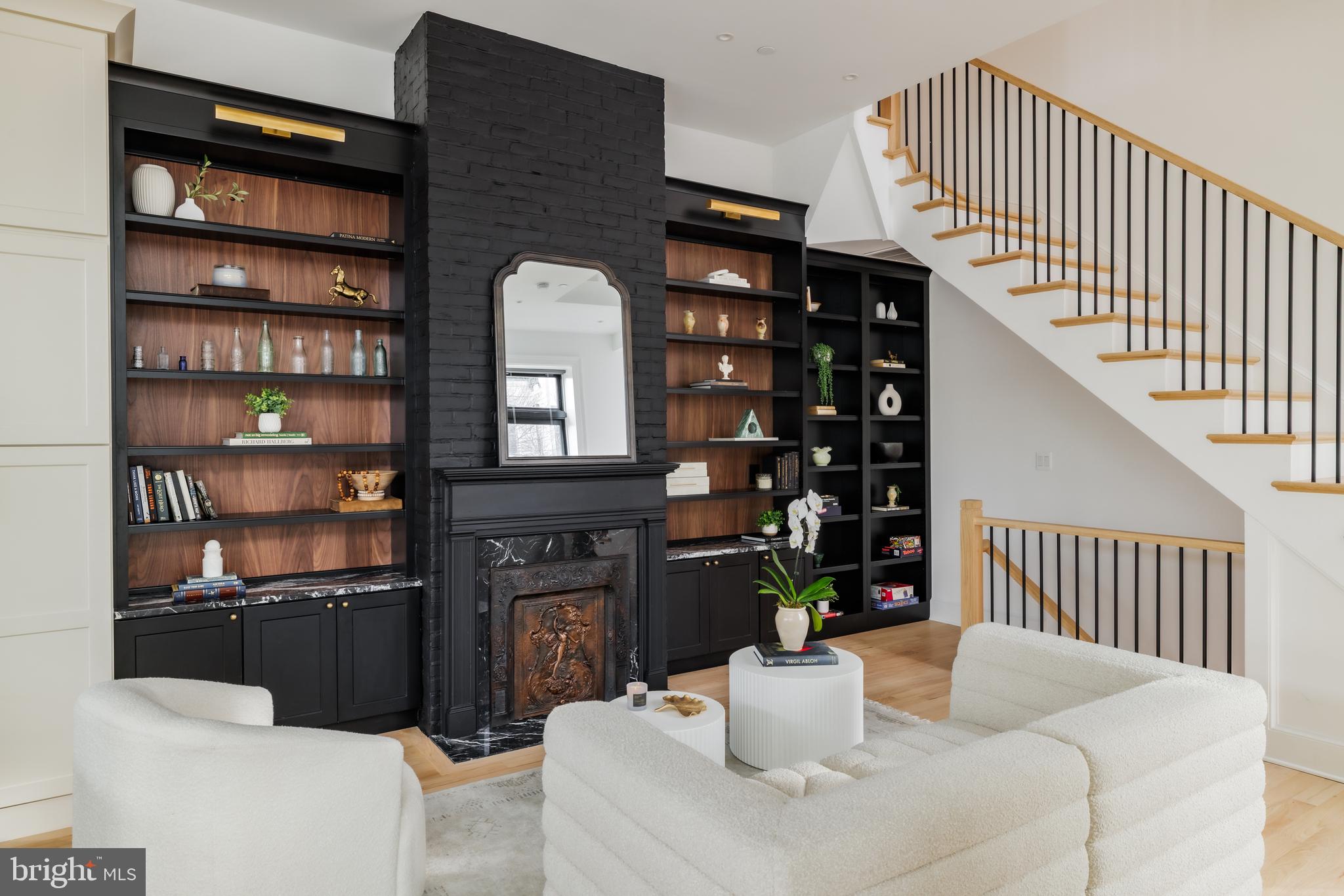 304 N Street Northwest, Unit 1 Washington, DC 20001 - Photo 5 of 47 a living room with furniture fireplace and cabinets