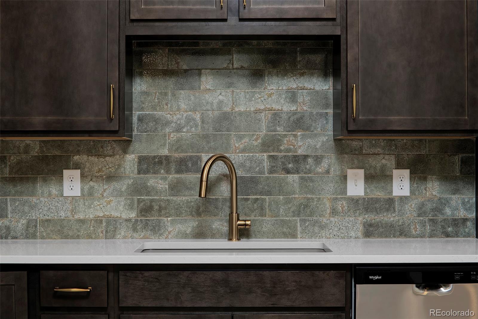 3136 West Bonfils Place Denver, CO 80236 - Photo 16 of 43 a close view of sink and tap