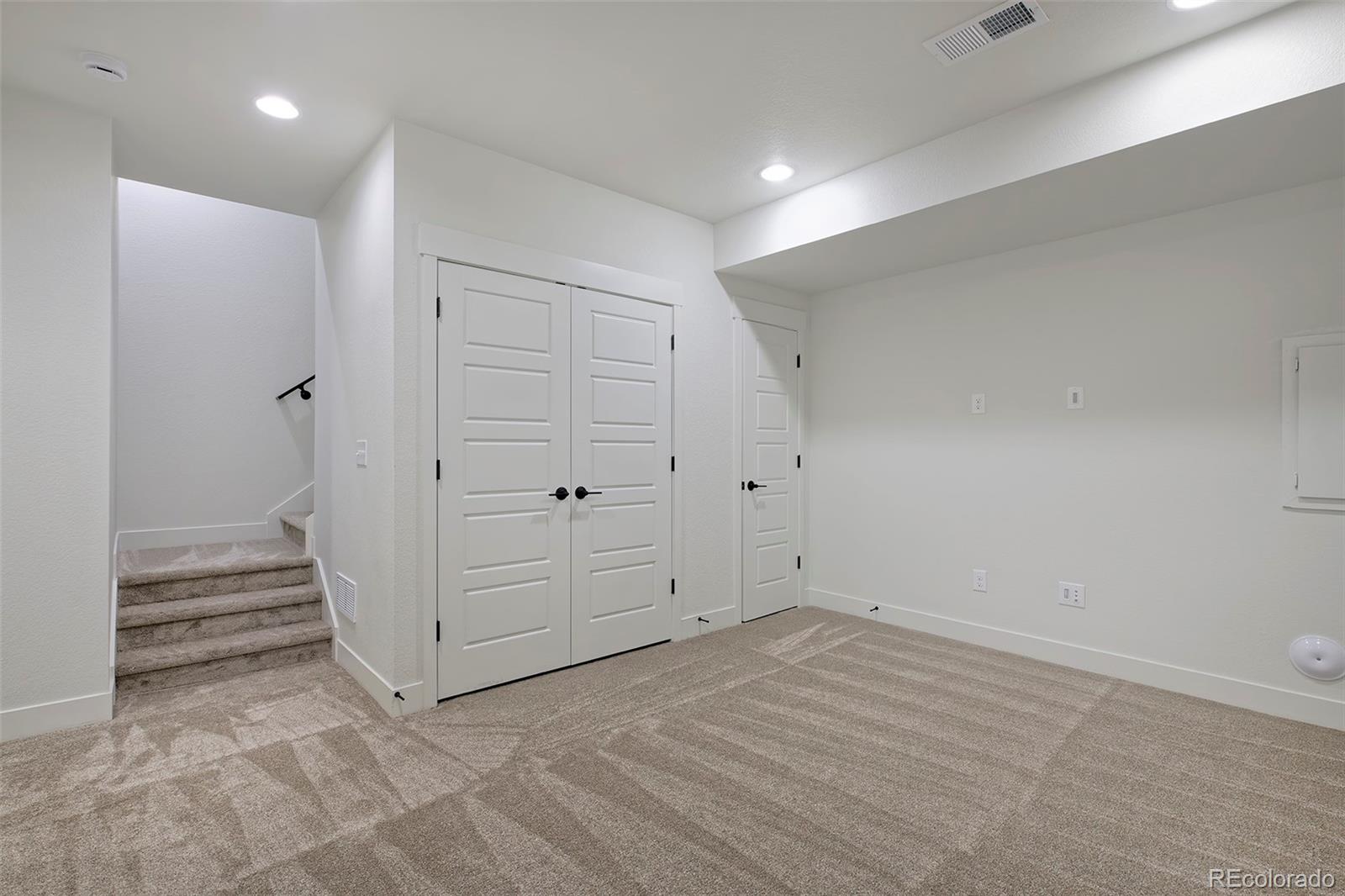3136 West Bonfils Place Denver, CO 80236 - Photo 37 of 43 wooden floor in an empty room