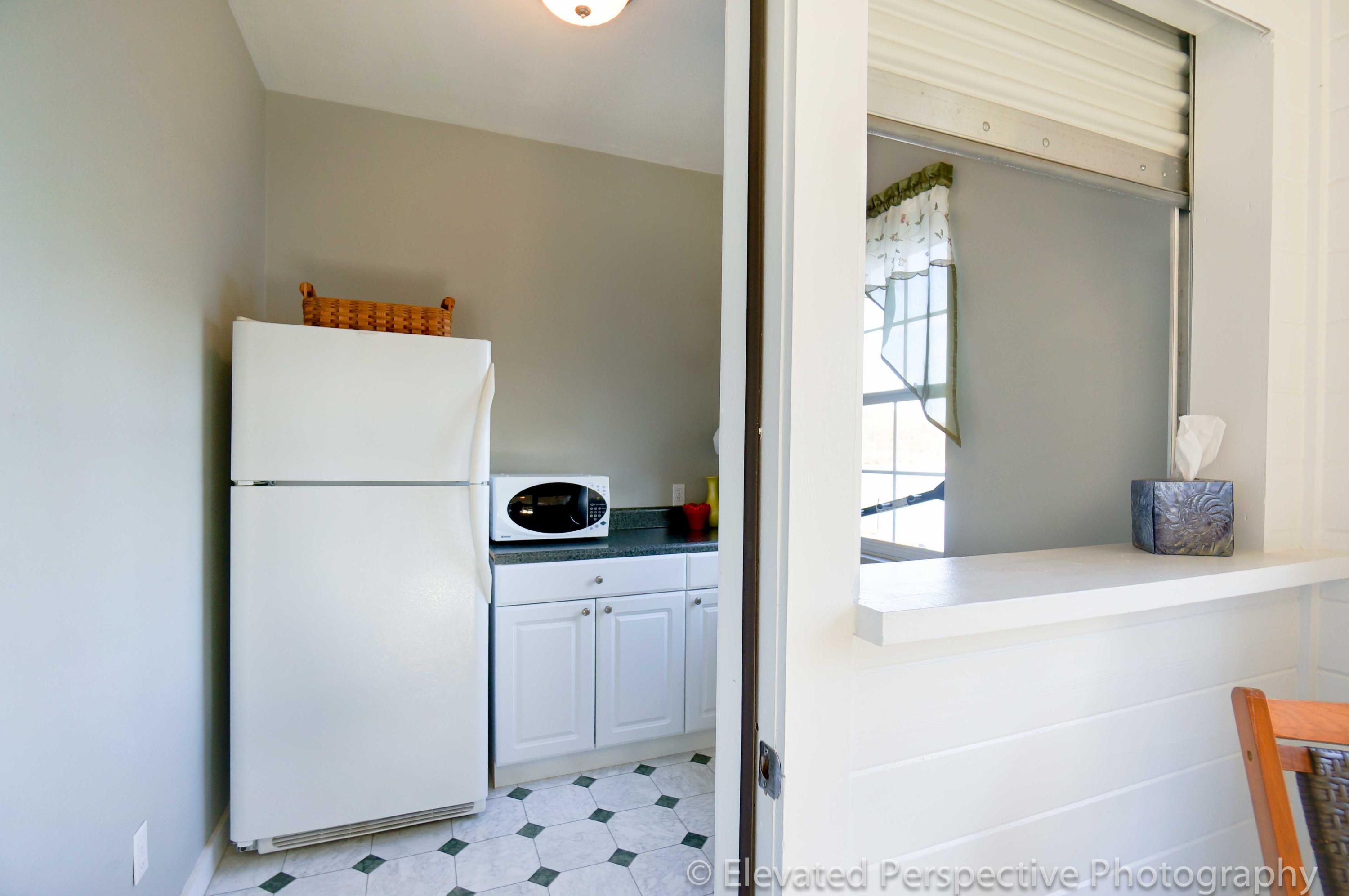 6248 Horseshoe Bend Road Goodview, VA 24095 - Photo 16 of 32 Dry Kitchen with Roll-top Bar