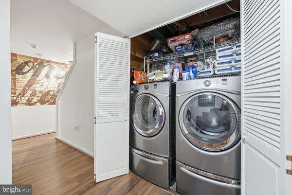 a storage room with washer and dryer
