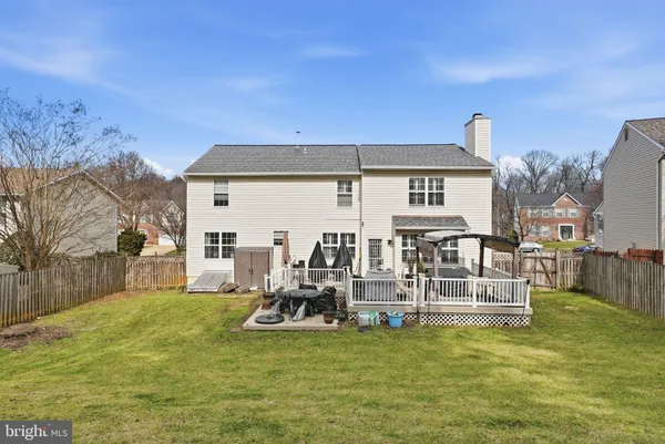 a view of a house with swimming pool
