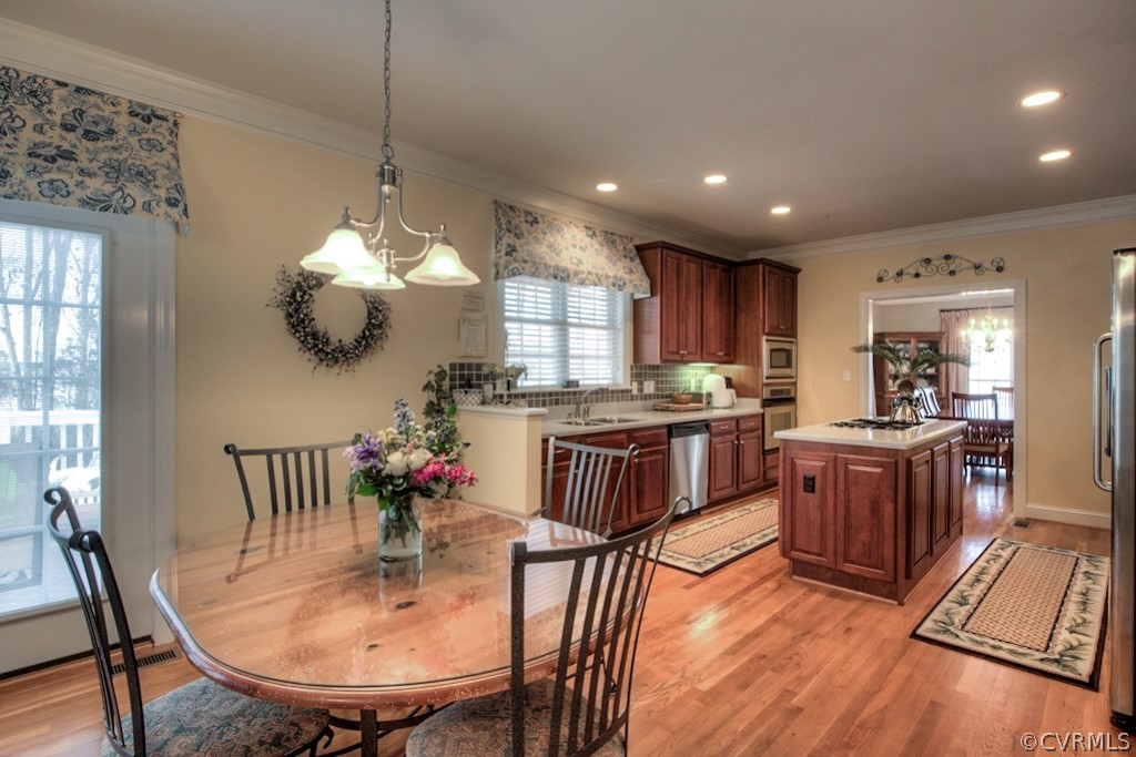 5800 Spinnaker Cove Road Midlothian, VA 23112 - Photo 22 of 50 Breakfast nook open to kitchen and family room.