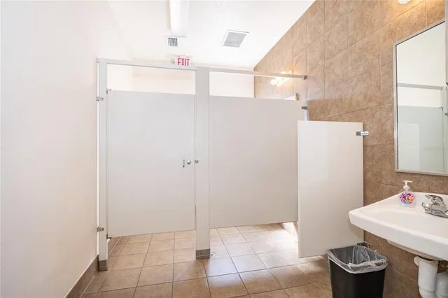 a bathroom with a sink and a toilet