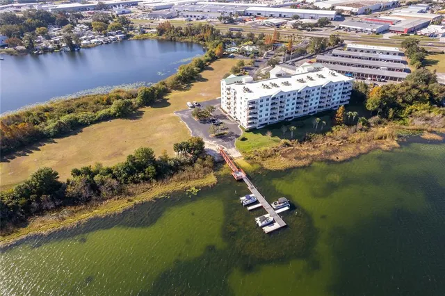 a aerial view of a house with a lake view