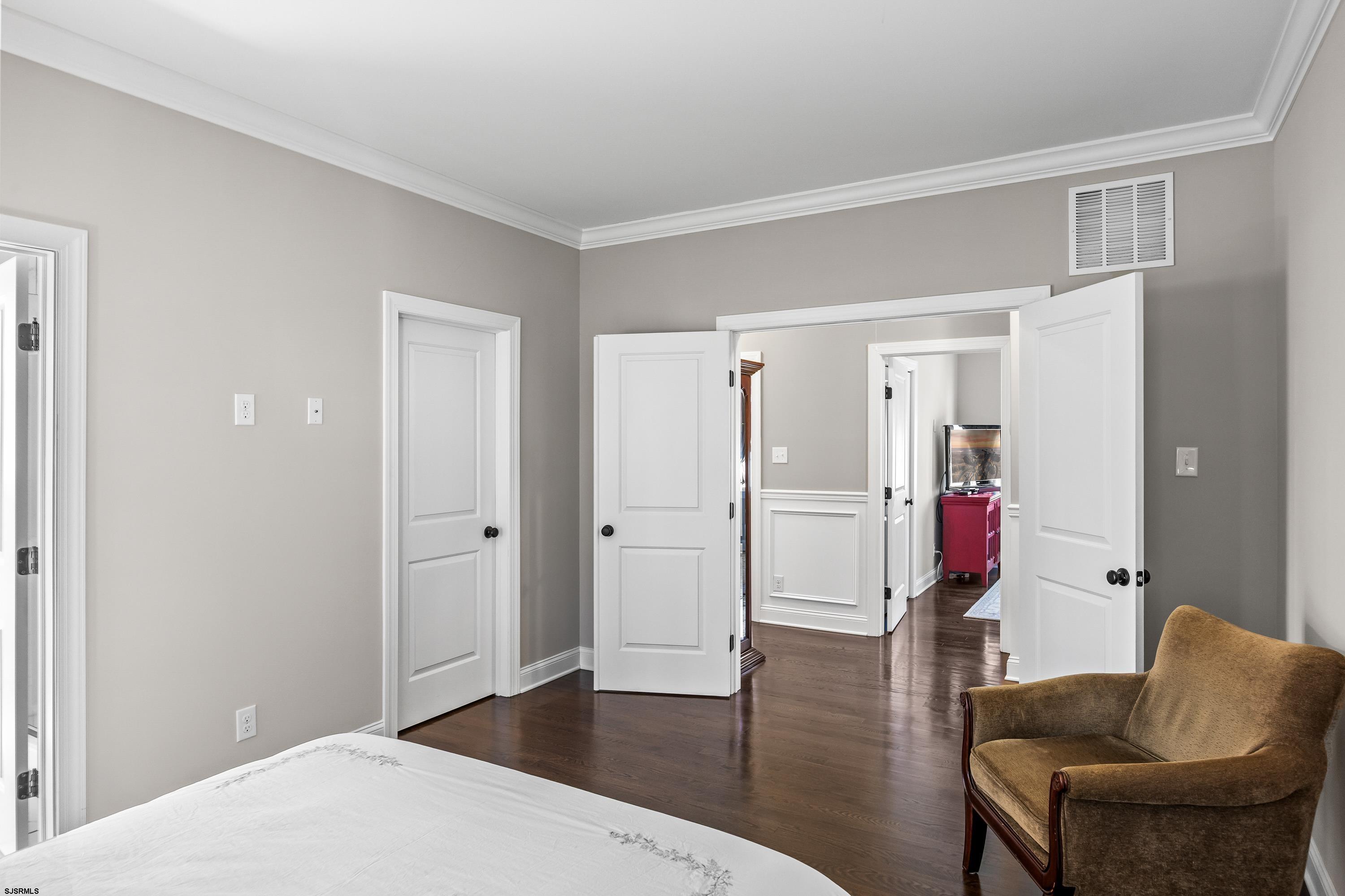 215 Surf Road Egg Harbor Township, NJ 08234 - Photo 15 of 31 a living room with furniture and a wooden floor