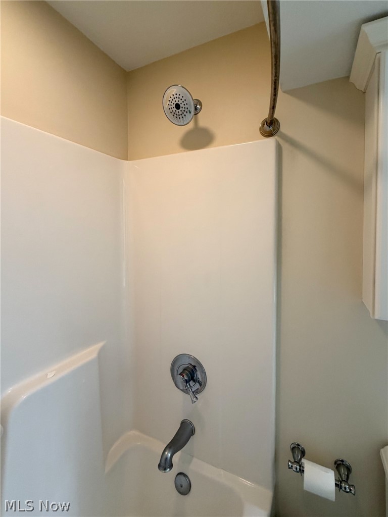 1343 Courtland Road Weirton, WV 26062 - Photo 45 of 50 Bathroom view of toilet and washtub / shower combination