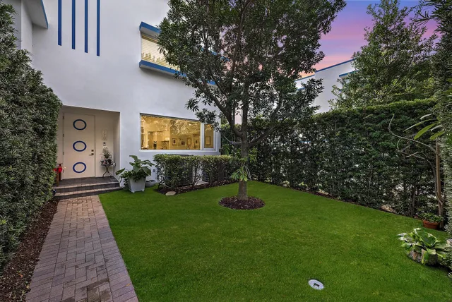 a view of a backyard with garden