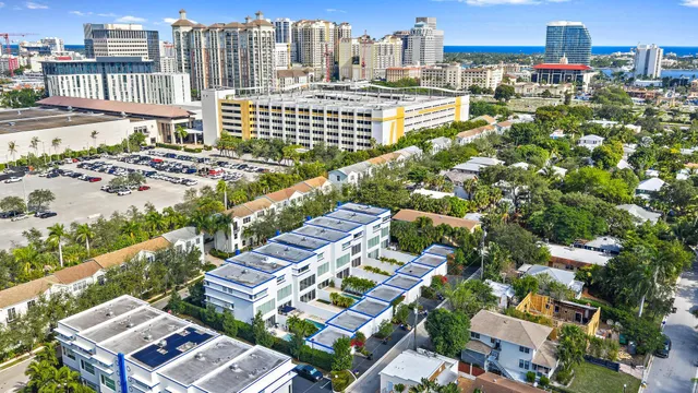 a view of city with ocean