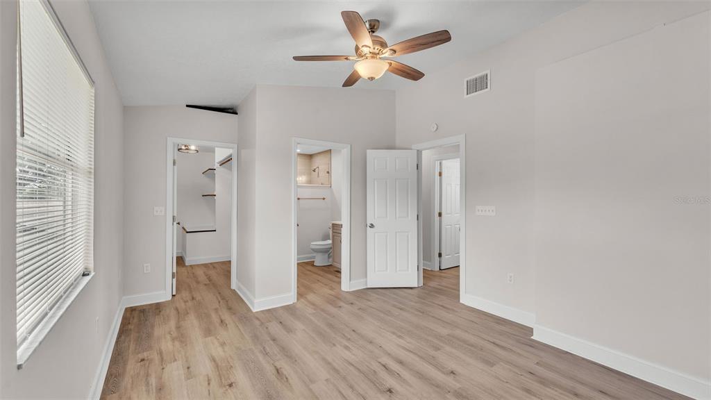 3806 Bent Tree Loop West Lakeland, FL 33813 - Photo 21 of 58 a view of an empty room and wooden floor