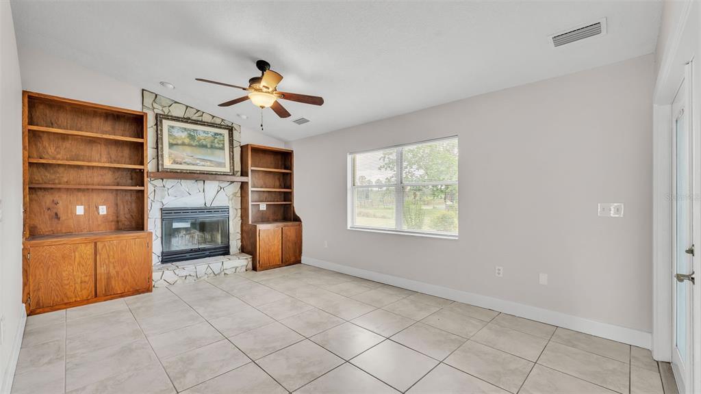 3806 Bent Tree Loop West Lakeland, FL 33813 - Photo 27 of 58 a living room with furniture and natural light