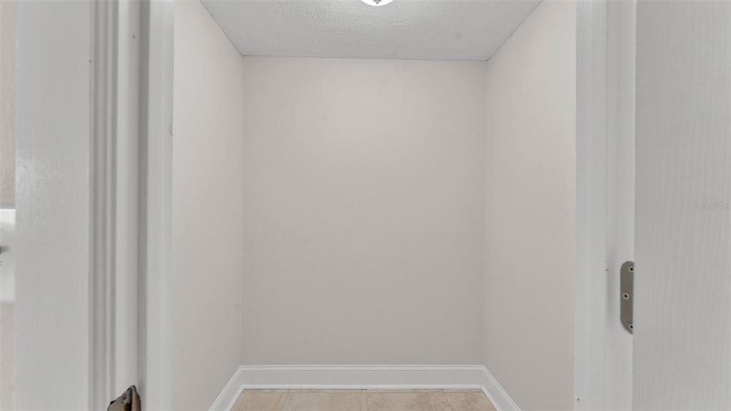 3806 Bent Tree Loop West Lakeland, FL 33813 - Photo 40 of 58 a view of small space with racks on the wall