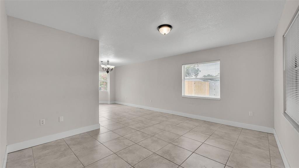 3806 Bent Tree Loop West Lakeland, FL 33813 - Photo 42 of 58 an empty room with a empty space and windows