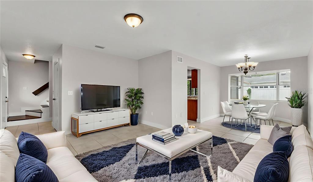 3806 Bent Tree Loop West Lakeland, FL 33813 - Photo 58 of 58 a living room with furniture and a flat screen tv