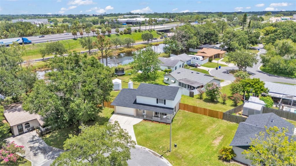3806 Bent Tree Loop West Lakeland, FL 33813 - Photo 6 of 58 an aerial view of residential houses with outdoor space and river