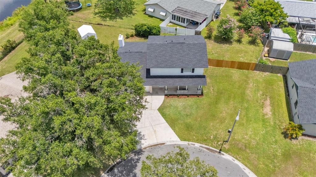 3806 Bent Tree Loop West Lakeland, FL 33813 - Photo 7 of 58 an aerial view of a house with swimming pool
