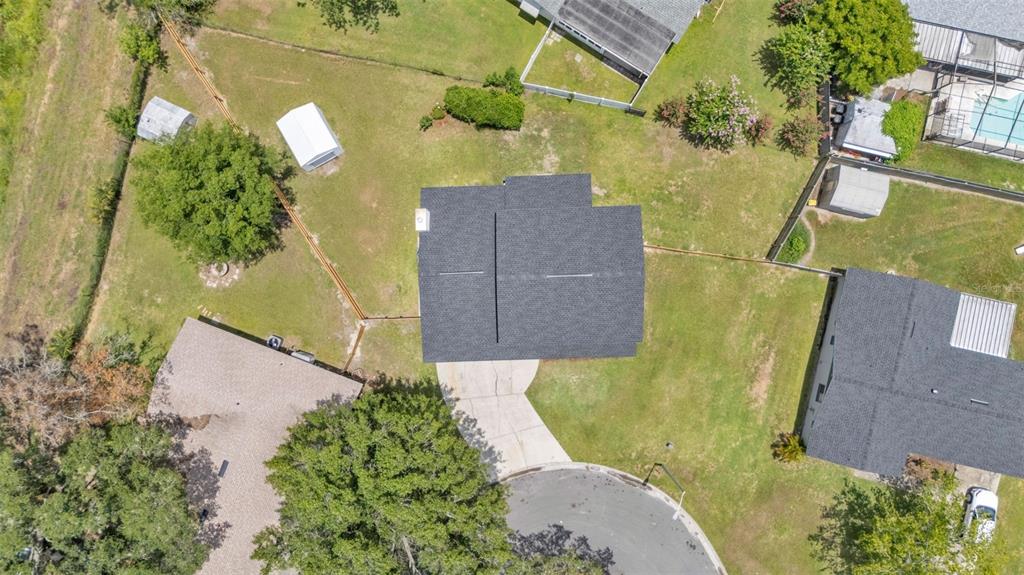 3806 Bent Tree Loop West Lakeland, FL 33813 - Photo 9 of 58 an aerial view of a house with a yard