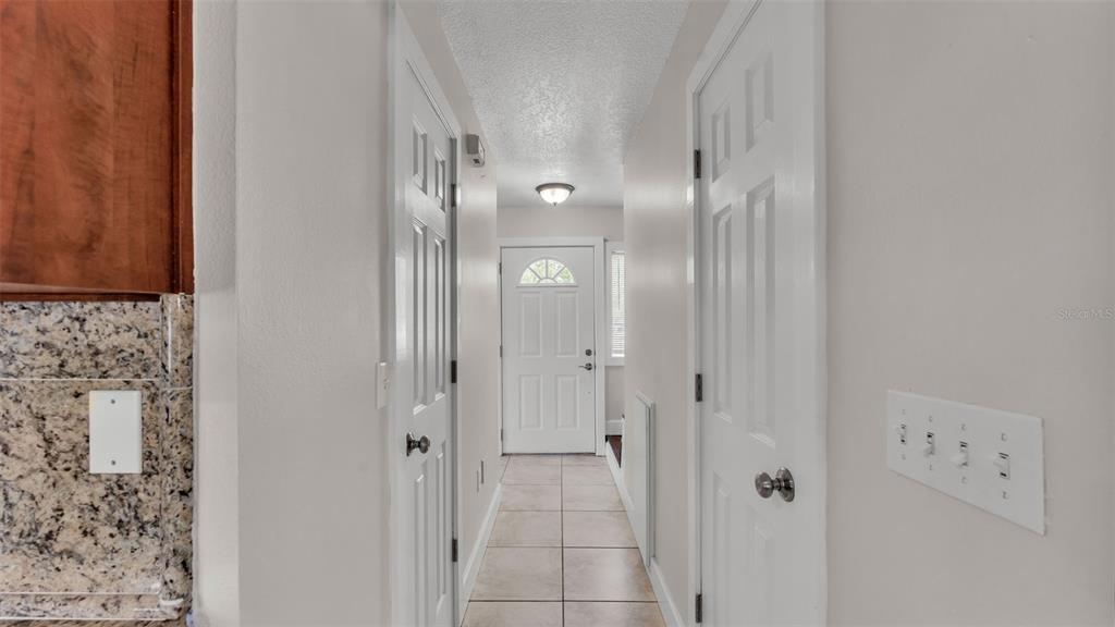 3806 Bent Tree Loop West Lakeland, FL 33813 - Photo 10 of 58 a view of a bathroom with a glass shower door