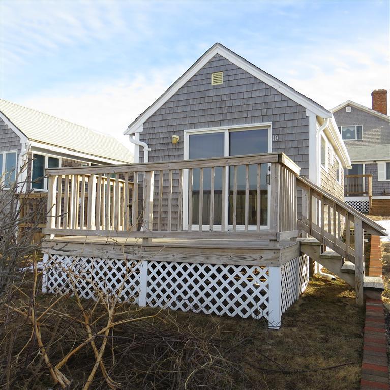 168 Shore Road, Unit 10 Truro, MA 02666 - Photo 1 of 9 a front view of a house