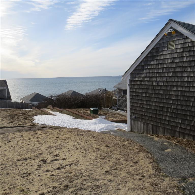 168 Shore Road, Unit 10 Truro, MA 02666 - Photo 2 of 9 a view of outdoor space and front view of a house